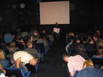 Audience wins posters, checks seat #